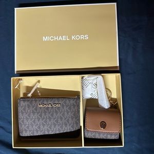 Michael Kors coin purse and Apple AirPod case